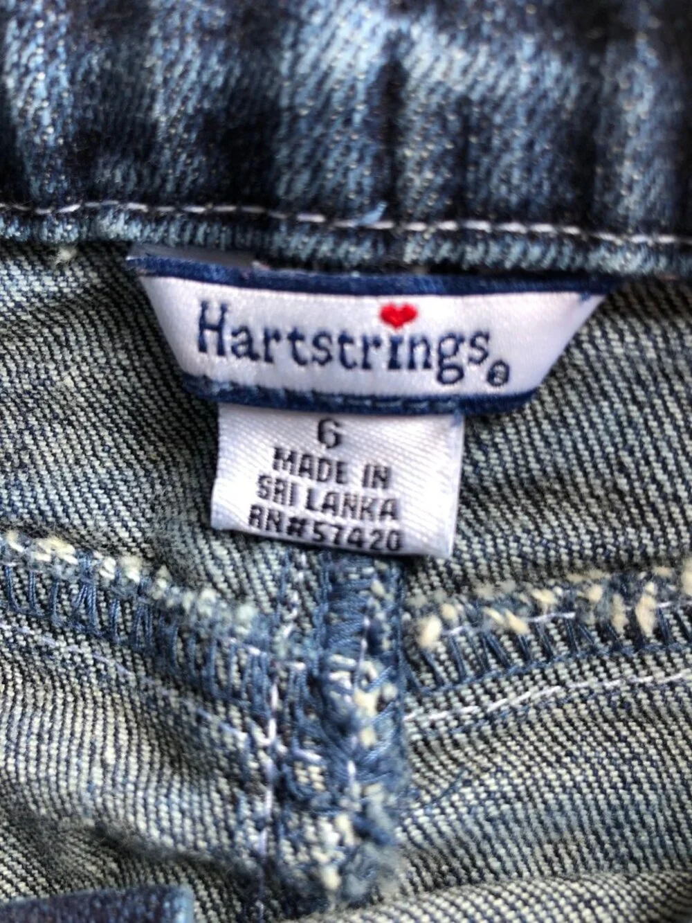 Hartstrings front button